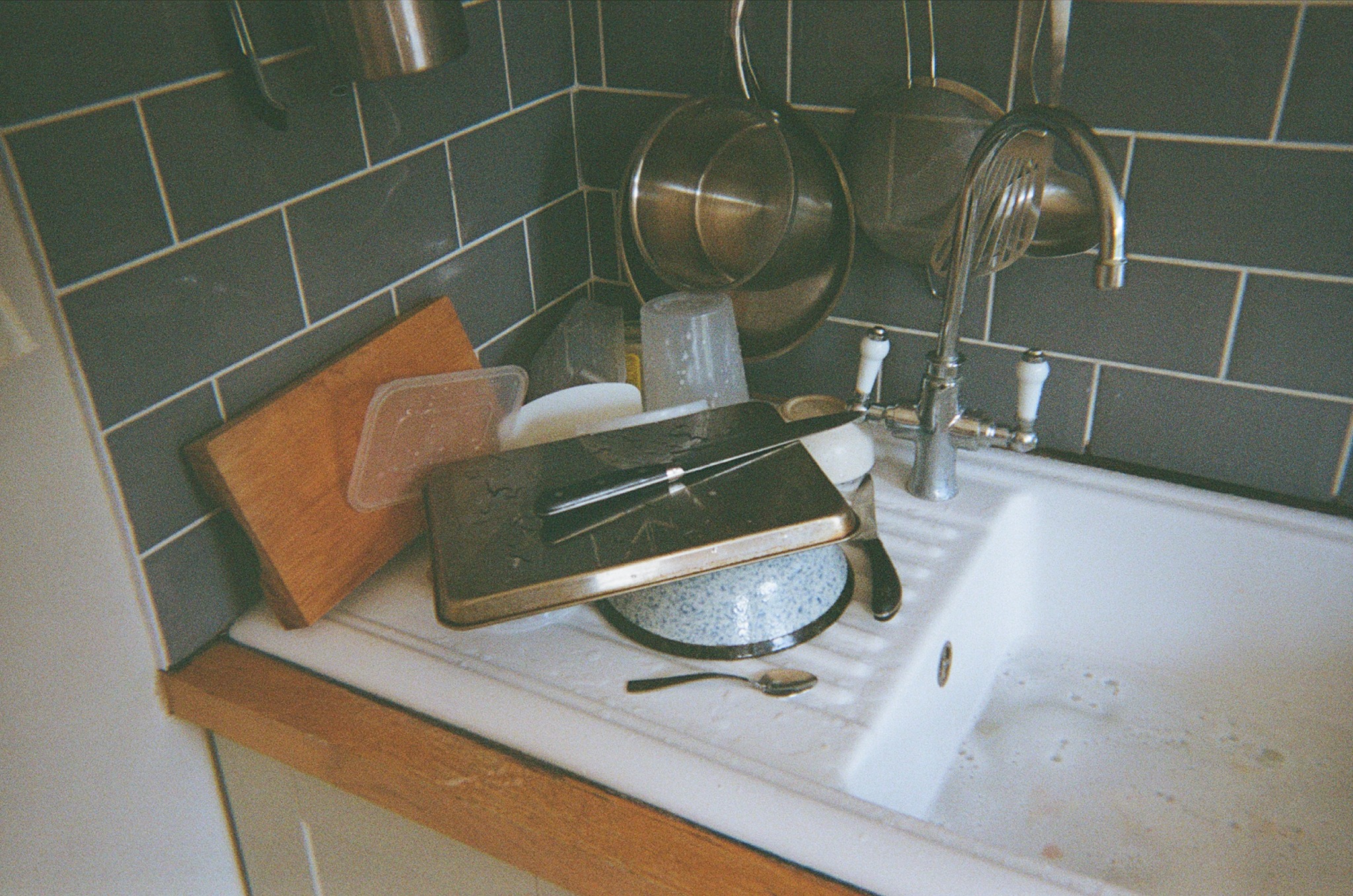 Kitchen sink and stacked dishes